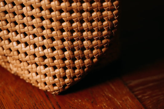 Weave leather as you would weave a basket.