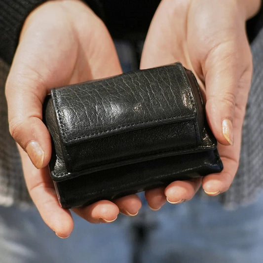 Wallet & Mind — To stay light, yet keep what matters close.