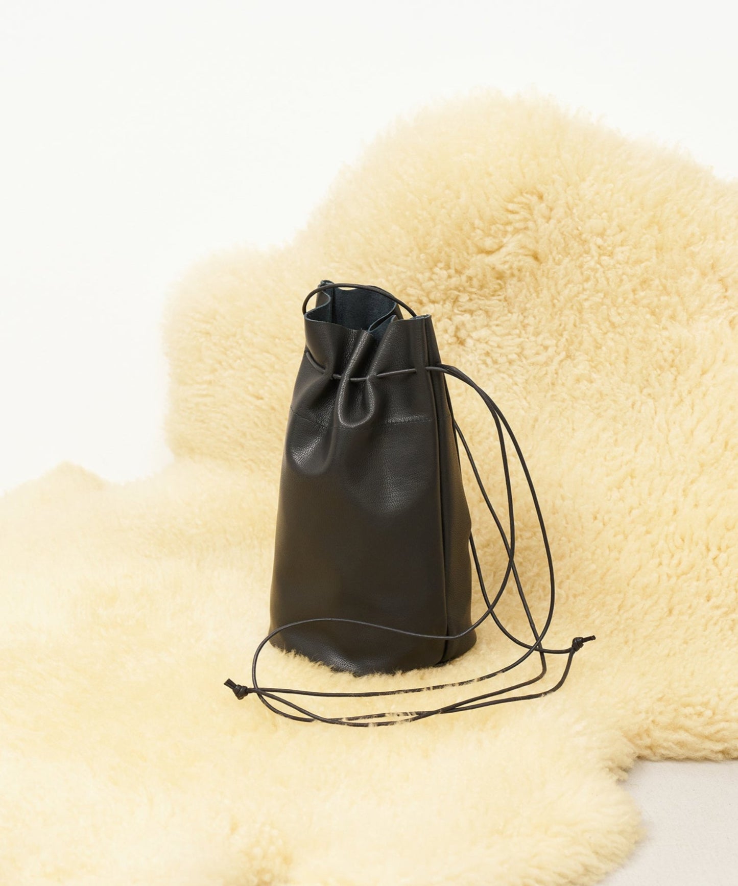 #15 / Canister bottle (black) / goatskin "STILL"