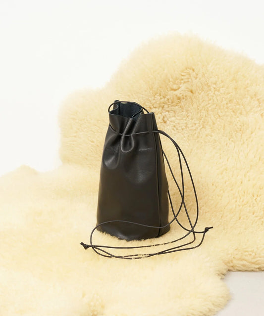 Canister bottle / goatskin Still
