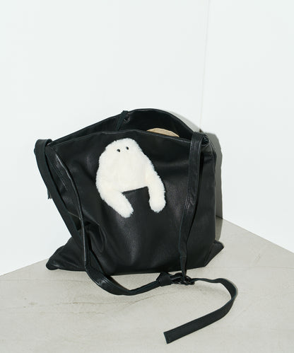 It features a dedicated outer pocket designed to hold a plush toy and is available as a limited-edition set with an Opantsu-kun plush pouch.
