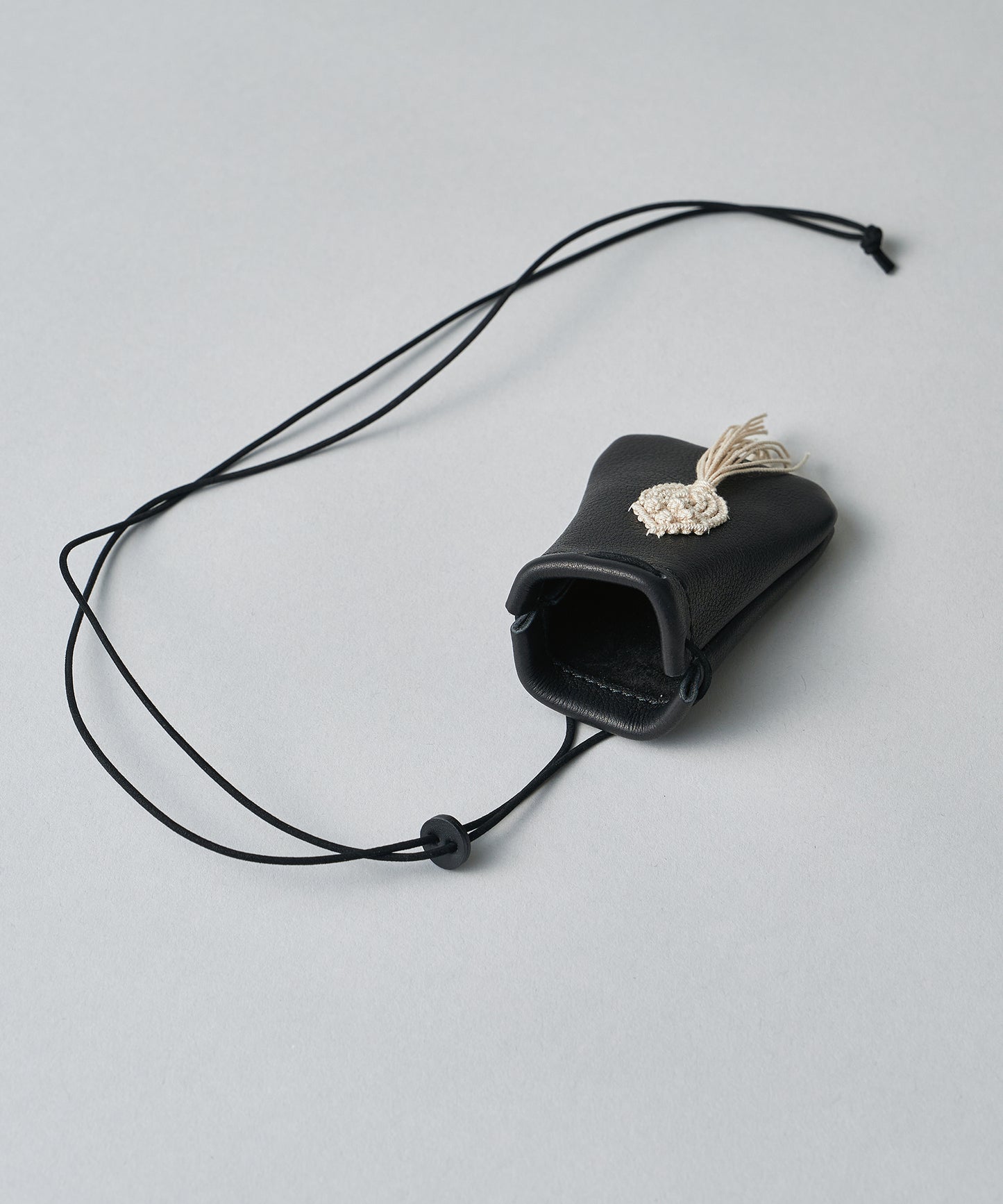 #55/ Amulet Pouch XS (Sawa Matsuda Collaboration / black) / cowhide "BABY BUFFALO"