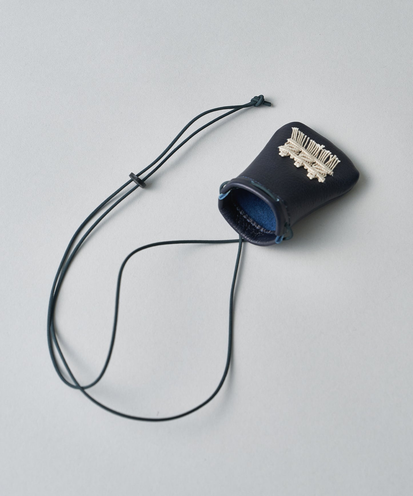 #55b/ Amulet Pouch XS (Sawa Matsuda Collaboration / indigo blue) / cowhide "BABY BUFFALO"